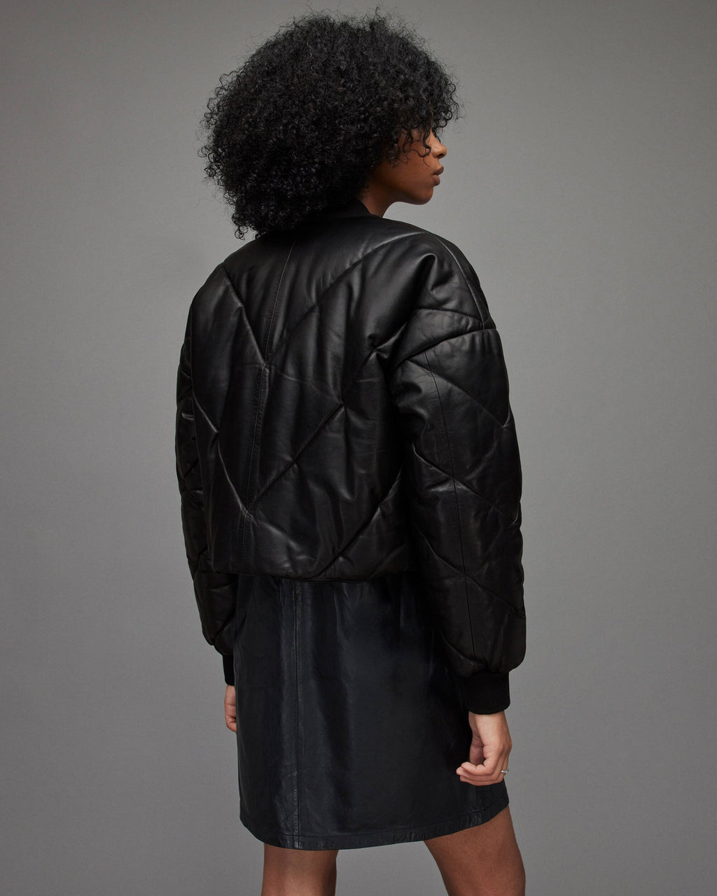 Women's Black Puffer Leather Jacket – Stylish & Warm